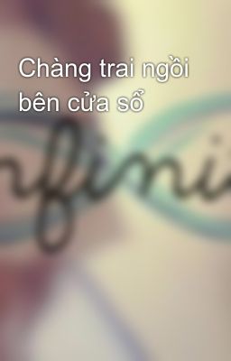 Chàng trai ngồi bên cửa sổ